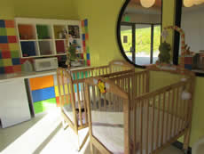 cribs inside playroom