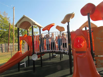 preschoolers playing at the slide
